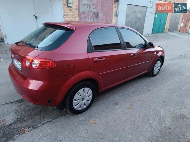 Красный Шевроле Лачетти, объемом двигателя 1.6 л и пробегом 261 тыс. км за 3650 $, фото 9 на Automoto.ua