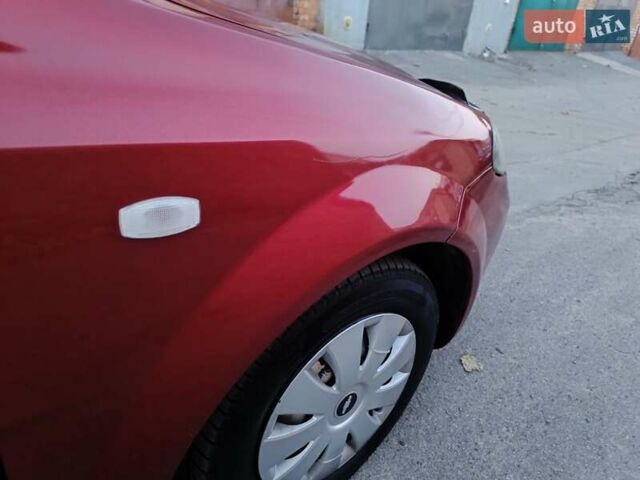 Красный Шевроле Лачетти, объемом двигателя 1.6 л и пробегом 261 тыс. км за 3650 $, фото 14 на Automoto.ua