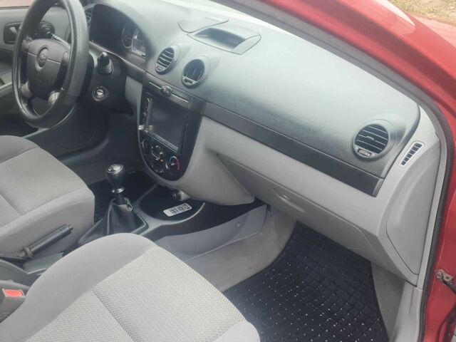 Красный Шевроле Лачетти, объемом двигателя 1.4 л и пробегом 259 тыс. км за 3500 $, фото 10 на Automoto.ua