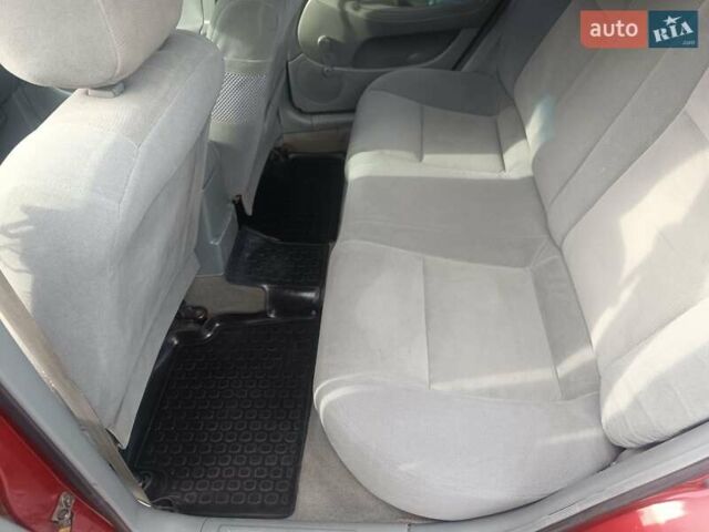 Красный Шевроле Лачетти, объемом двигателя 1.6 л и пробегом 261 тыс. км за 3650 $, фото 27 на Automoto.ua