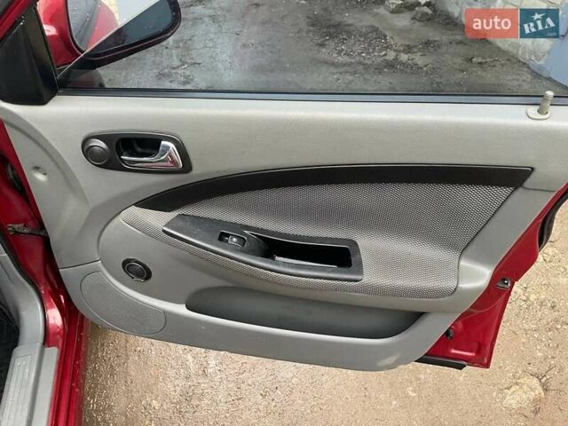 Красный Шевроле Лачетти, объемом двигателя 1.8 л и пробегом 121 тыс. км за 3750 $, фото 31 на Automoto.ua