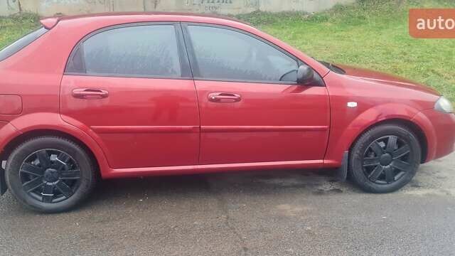 Красный Шевроле Лачетти, объемом двигателя 1.4 л и пробегом 259 тыс. км за 3500 $, фото 12 на Automoto.ua