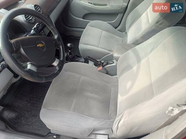 Красный Шевроле Лачетти, объемом двигателя 1.6 л и пробегом 261 тыс. км за 3650 $, фото 20 на Automoto.ua