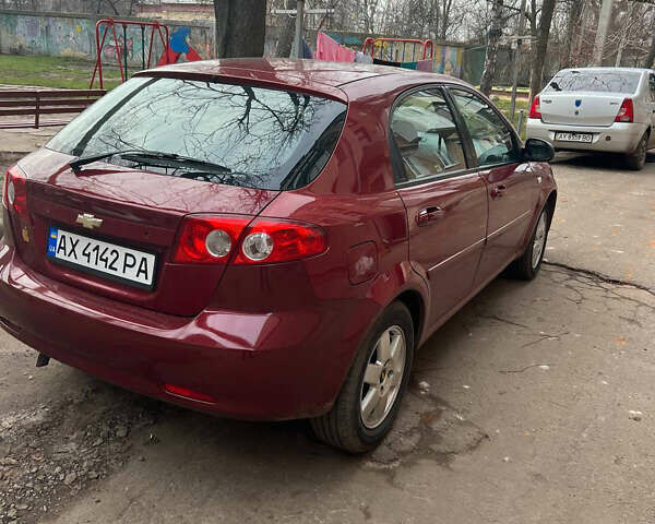 Красный Шевроле Лачетти, объемом двигателя 1.4 л и пробегом 200 тыс. км за 3200 $, фото 4 на Automoto.ua