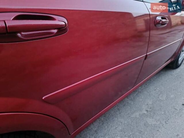 Красный Шевроле Лачетти, объемом двигателя 1.6 л и пробегом 261 тыс. км за 3650 $, фото 10 на Automoto.ua