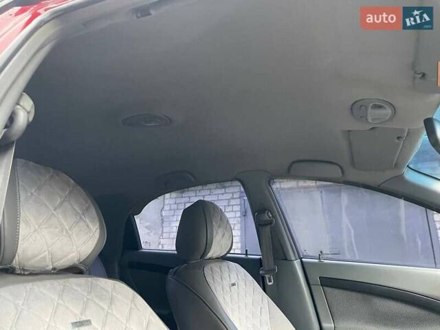 Красный Шевроле Лачетти, объемом двигателя 1.8 л и пробегом 121 тыс. км за 3750 $, фото 1 на Automoto.ua