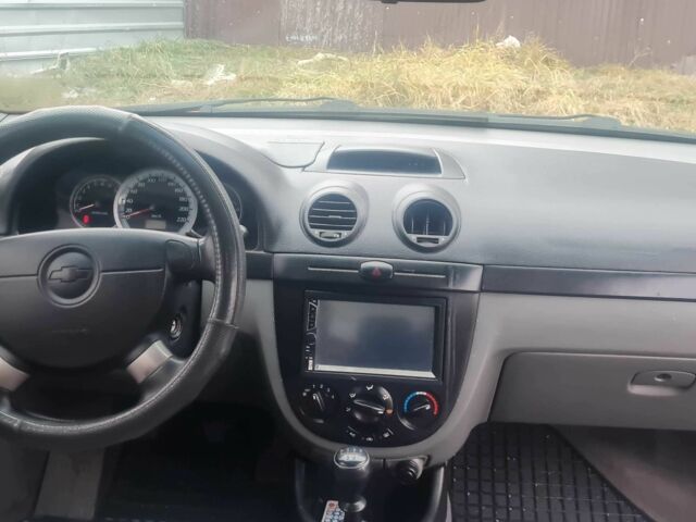 Красный Шевроле Лачетти, объемом двигателя 1.4 л и пробегом 259 тыс. км за 3500 $, фото 7 на Automoto.ua