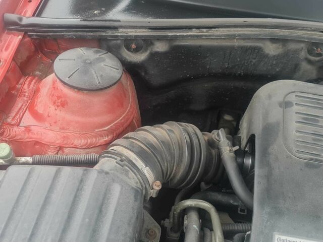 Красный Шевроле Лачетти, объемом двигателя 1.4 л и пробегом 259 тыс. км за 3500 $, фото 3 на Automoto.ua