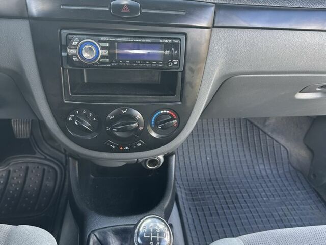 Червоний Шевроле Лачетті, об'ємом двигуна 1.6 л та пробігом 206 тис. км за 2800 $, фото 11 на Automoto.ua