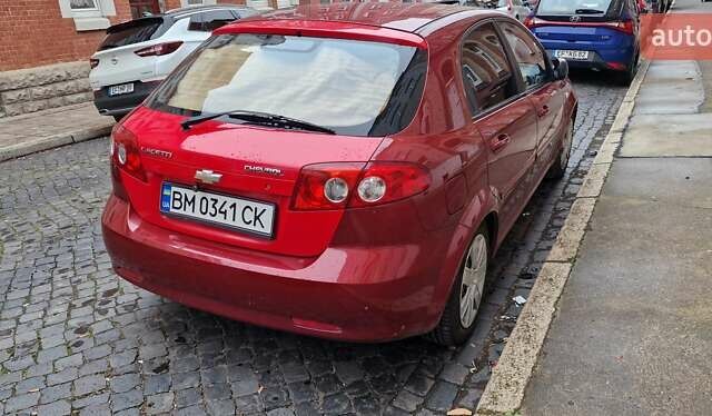Красный Шевроле Лачетти, объемом двигателя 1.4 л и пробегом 173 тыс. км за 4500 $, фото 4 на Automoto.ua