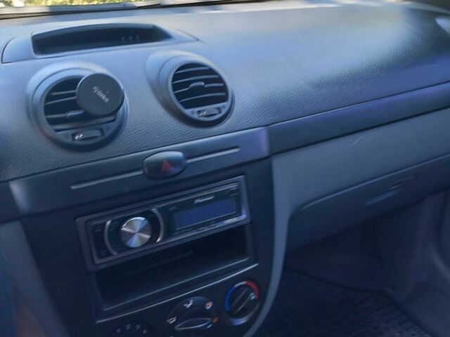 Красный Шевроле Лачетти, объемом двигателя 1.6 л и пробегом 87 тыс. км за 4993 $, фото 3 на Automoto.ua