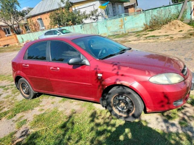 Красный Шевроле Лачетти, объемом двигателя 1.6 л и пробегом 303 тыс. км за 3300 $, фото 9 на Automoto.ua