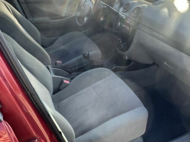 Червоний Шевроле Лачетті, об'ємом двигуна 1.6 л та пробігом 206 тис. км за 2800 $, фото 8 на Automoto.ua