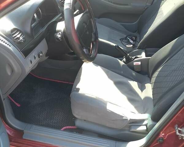 Красный Шевроле Лачетти, объемом двигателя 1.6 л и пробегом 303 тыс. км за 3300 $, фото 1 на Automoto.ua