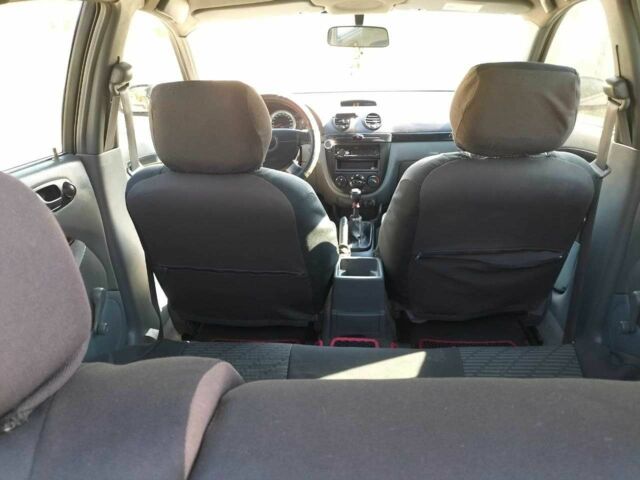 Красный Шевроле Лачетти, объемом двигателя 1.6 л и пробегом 303 тыс. км за 3300 $, фото 10 на Automoto.ua