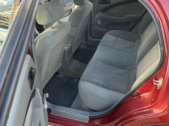 Червоний Шевроле Лачетті, об'ємом двигуна 1.6 л та пробігом 206 тис. км за 2800 $, фото 9 на Automoto.ua