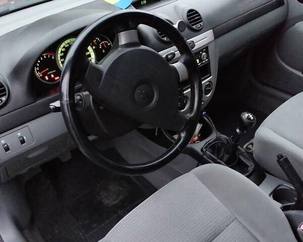 Красный Шевроле Лачетти, объемом двигателя 1.6 л и пробегом 174 тыс. км за 4700 $, фото 19 на Automoto.ua