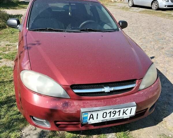 Красный Шевроле Лачетти, объемом двигателя 1.6 л и пробегом 303 тыс. км за 3300 $, фото 8 на Automoto.ua
