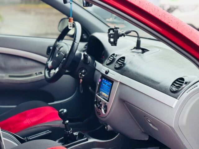 Червоний Шевроле Лачетті, об'ємом двигуна 1.6 л та пробігом 200 тис. км за 3850 $, фото 7 на Automoto.ua