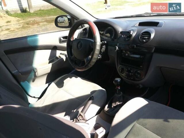 Красный Шевроле Лачетти, объемом двигателя 1.6 л и пробегом 303 тыс. км за 3300 $, фото 2 на Automoto.ua