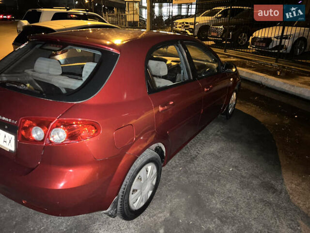 Красный Шевроле Лачетти, объемом двигателя 1.6 л и пробегом 200 тыс. км за 3350 $, фото 3 на Automoto.ua