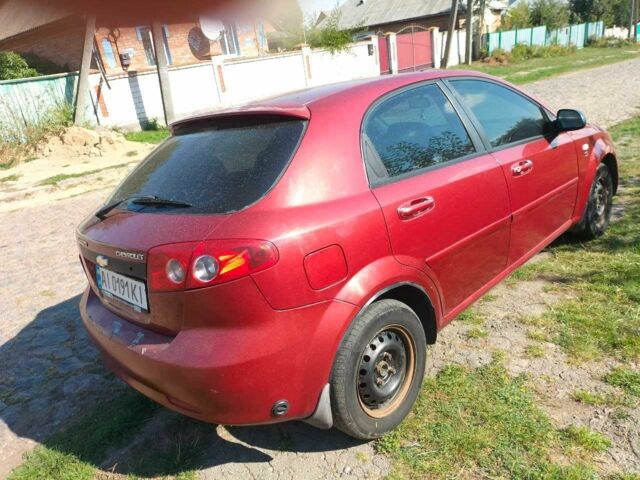 Красный Шевроле Лачетти, объемом двигателя 1.6 л и пробегом 303 тыс. км за 3300 $, фото 3 на Automoto.ua