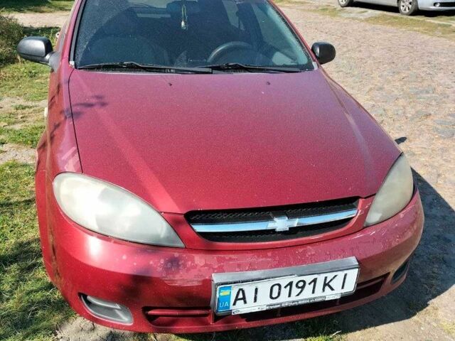 Красный Шевроле Лачетти, объемом двигателя 1.6 л и пробегом 303 тыс. км за 3300 $, фото 6 на Automoto.ua