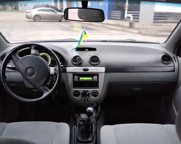 Красный Шевроле Лачетти, объемом двигателя 1.6 л и пробегом 174 тыс. км за 4700 $, фото 18 на Automoto.ua