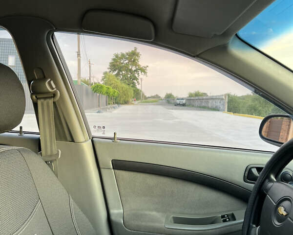 Шевроле Лачетти 2010 в Павлограде на Automoto.ua Красный Шевроле Лачетти, объемом двигателя 1.6 л и пробегом 86 тыс. км за 6450 $, фото 41 на Automoto.ua