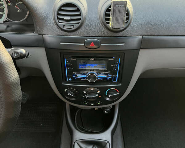 Шевроле Лачетти 2010 в Павлограде на Automoto.ua Красный Шевроле Лачетти, объемом двигателя 1.6 л и пробегом 86 тыс. км за 6450 $, фото 27 на Automoto.ua