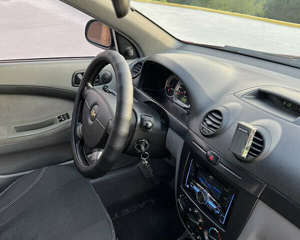 Шевроле Лачетти 2010 в Павлограде на Automoto.ua Красный Шевроле Лачетти, объемом двигателя 1.6 л и пробегом 86 тыс. км за 6450 $, фото 45 на Automoto.ua