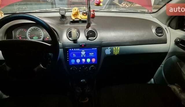 Червоний Шевроле Лачетті, об'ємом двигуна 1.6 л та пробігом 156 тис. км за 5400 $, фото 10 на Automoto.ua