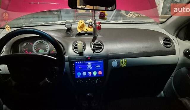 Червоний Шевроле Лачетті, об'ємом двигуна 1.6 л та пробігом 156 тис. км за 5400 $, фото 11 на Automoto.ua