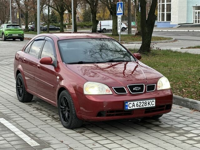 Красный Шевроле Лачетти, объемом двигателя 1.8 л и пробегом 230 тыс. км за 3550 $, фото 1 на Automoto.ua