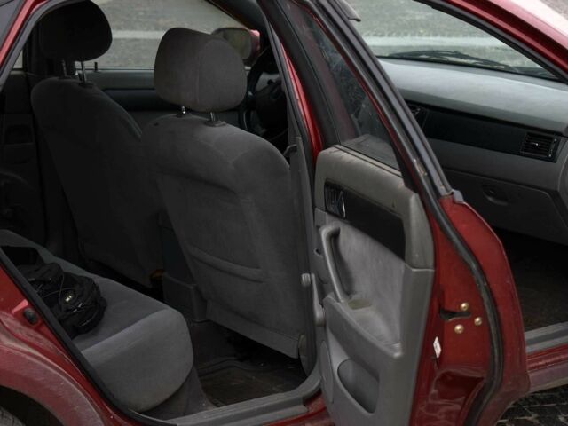 Красный Шевроле Лачетти, объемом двигателя 1.8 л и пробегом 365 тыс. км за 2800 $, фото 11 на Automoto.ua