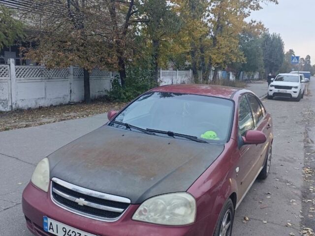 Красный Шевроле Лачетти, объемом двигателя 1.8 л и пробегом 287 тыс. км за 3300 $, фото 4 на Automoto.ua