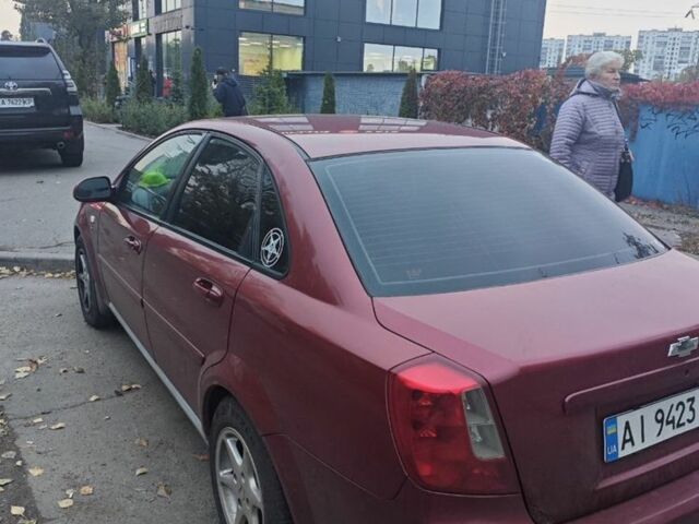 Красный Шевроле Лачетти, объемом двигателя 1.8 л и пробегом 287 тыс. км за 3300 $, фото 2 на Automoto.ua