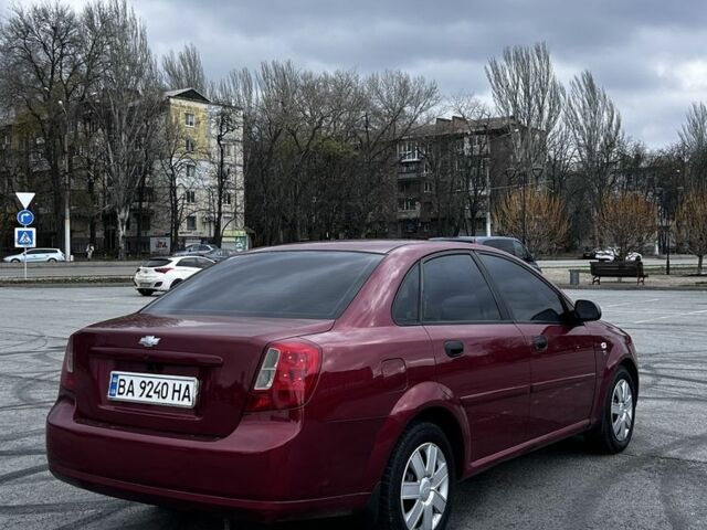 Красный Шевроле Лачетти, объемом двигателя 1.6 л и пробегом 222 тыс. км за 3999 $, фото 5 на Automoto.ua