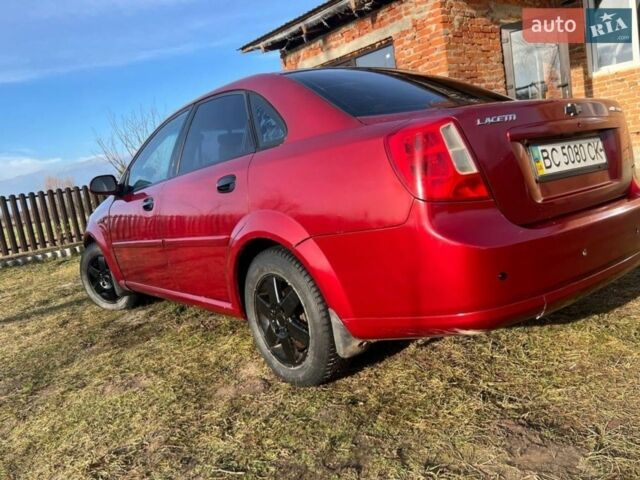 Красный Шевроле Лачетти, объемом двигателя 1.8 л и пробегом 328 тыс. км за 1800 $, фото 4 на Automoto.ua