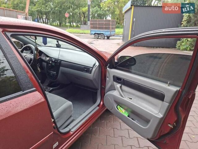 Красный Шевроле Лачетти, объемом двигателя 1.6 л и пробегом 270 тыс. км за 2800 $, фото 23 на Automoto.ua