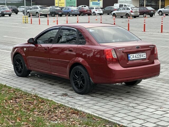 Красный Шевроле Лачетти, объемом двигателя 1.8 л и пробегом 230 тыс. км за 3550 $, фото 4 на Automoto.ua