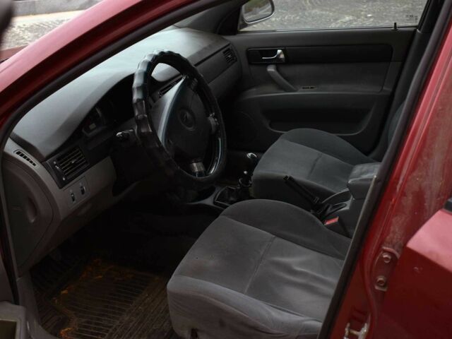 Красный Шевроле Лачетти, объемом двигателя 1.8 л и пробегом 365 тыс. км за 2800 $, фото 9 на Automoto.ua