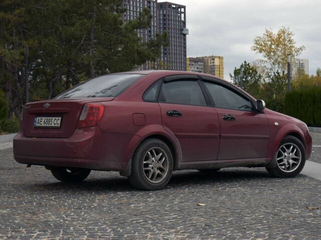 Красный Шевроле Лачетти, объемом двигателя 1.8 л и пробегом 365 тыс. км за 2800 $, фото 3 на Automoto.ua