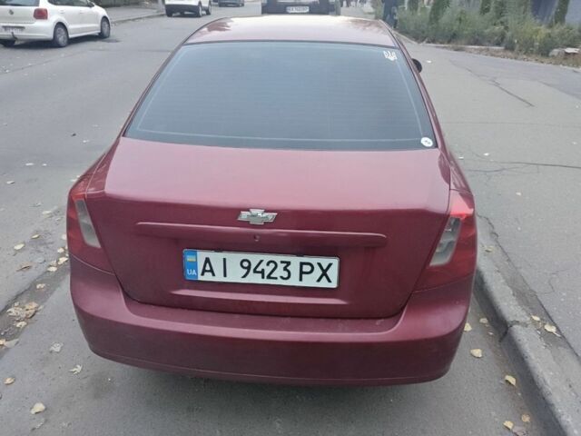 Красный Шевроле Лачетти, объемом двигателя 1.8 л и пробегом 287 тыс. км за 3300 $, фото 1 на Automoto.ua