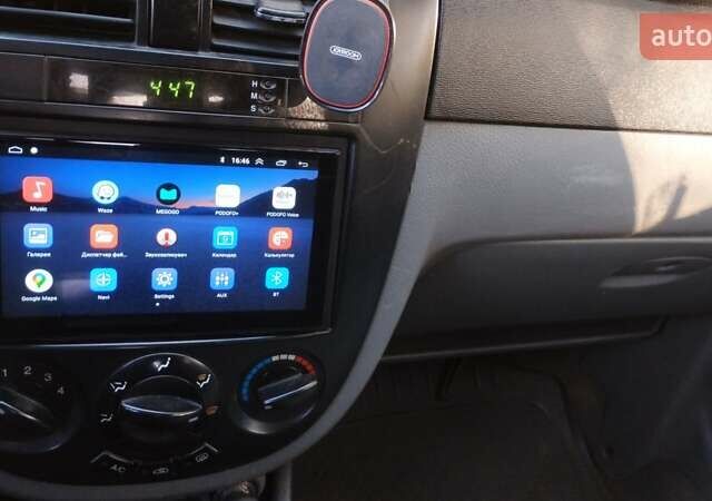 Червоний Шевроле Лачетті, об'ємом двигуна 1.8 л та пробігом 136 тис. км за 4700 $, фото 14 на Automoto.ua