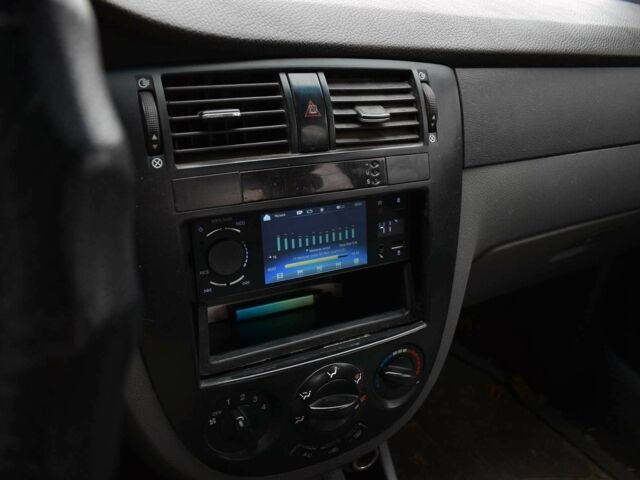 Красный Шевроле Лачетти, объемом двигателя 1.8 л и пробегом 365 тыс. км за 2800 $, фото 19 на Automoto.ua