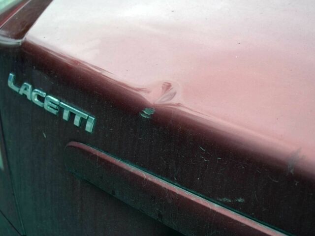 Красный Шевроле Лачетти, объемом двигателя 1.8 л и пробегом 365 тыс. км за 2800 $, фото 16 на Automoto.ua