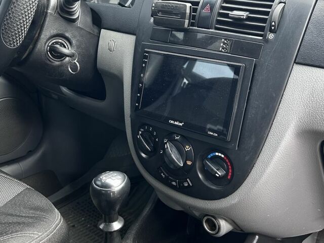 Красный Шевроле Лачетти, объемом двигателя 1.6 л и пробегом 222 тыс. км за 3999 $, фото 13 на Automoto.ua