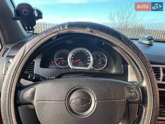 Красный Шевроле Лачетти, объемом двигателя 1.8 л и пробегом 328 тыс. км за 1800 $, фото 1 на Automoto.ua