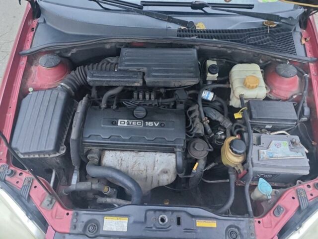 Красный Шевроле Лачетти, объемом двигателя 1.8 л и пробегом 287 тыс. км за 3300 $, фото 6 на Automoto.ua